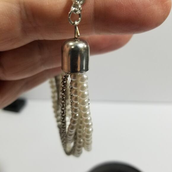 Two bracelets one copper colored bangle one multi chain faux - Picture 4 of 13